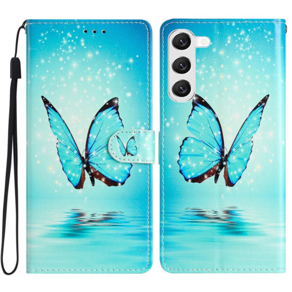 Kožený Kryt Samsung Galaxy S24 Plus 5g Modrý Motýl V Letu S Popruhem