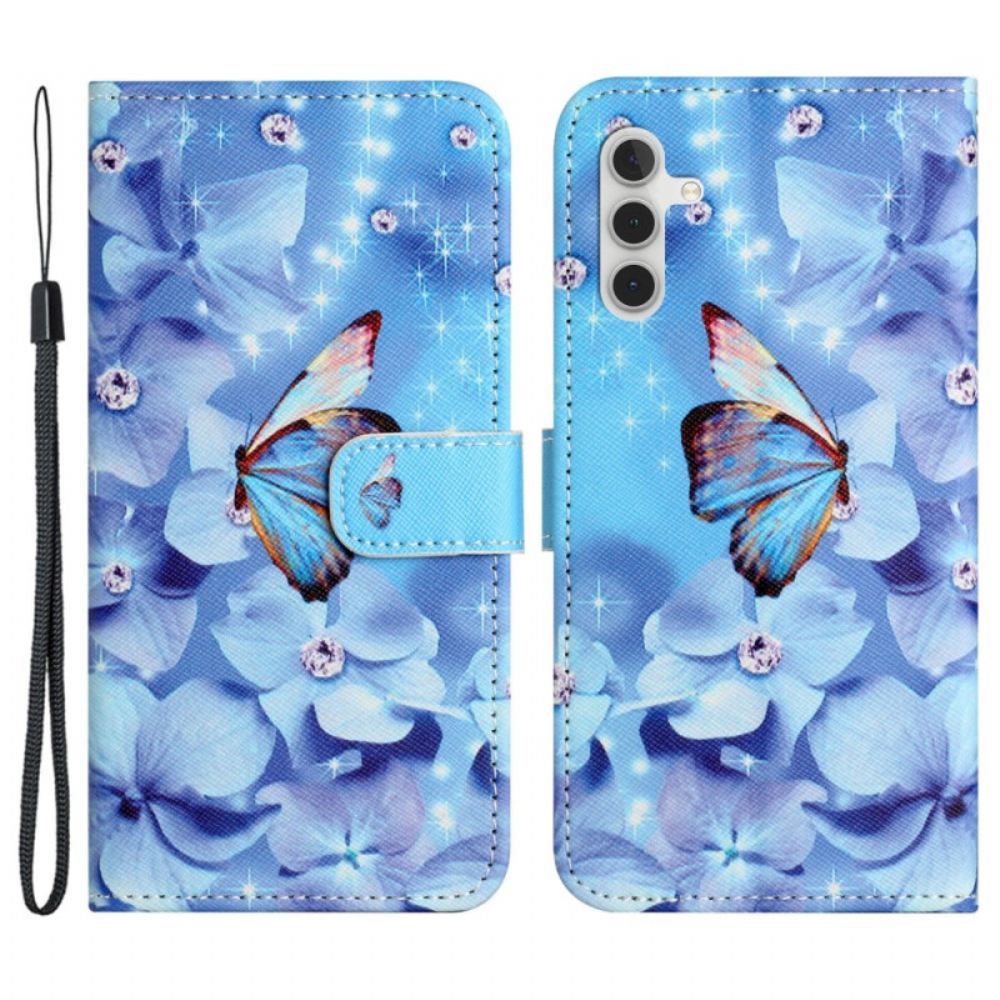 Kožený Kryt Samsung Galaxy S24 Fe Modré Květiny A Motýli S Popruhem