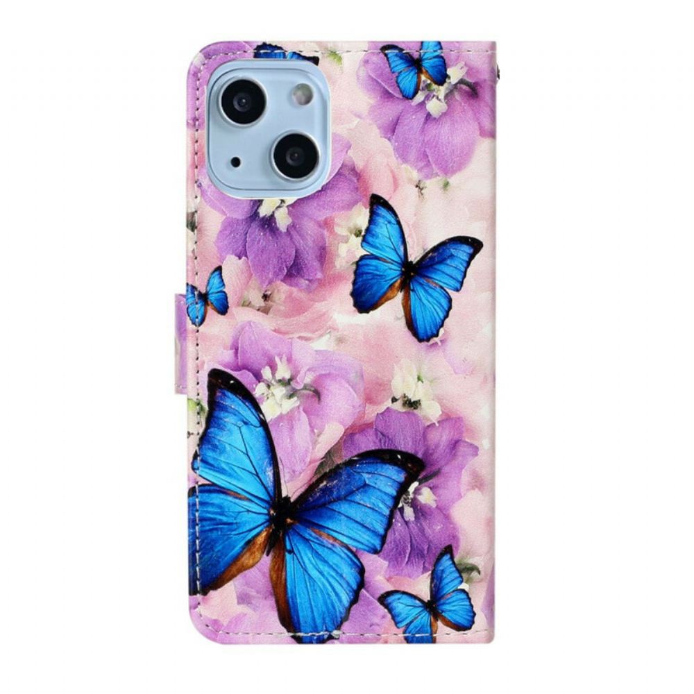 Flipové Pouzdro Na iPhone 13 Mini Modrí Motýli V Květinách