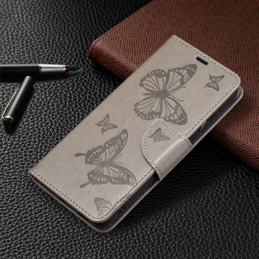 Flipové Pouzdro Na Samsung Galaxy S21 FE Motýli V Letu S Lanyardem
