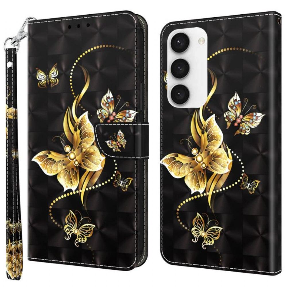 Flipové Pouzdro Na Samsung Galaxy S23 5G Na Lana Zlatý Řemínek S Motýly