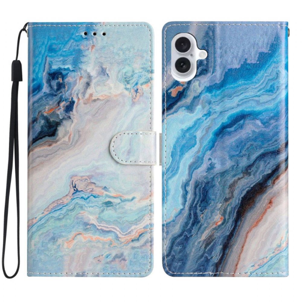Kožený Kryt iPhone 16 Modrý Mramorový Vzor S Páskem