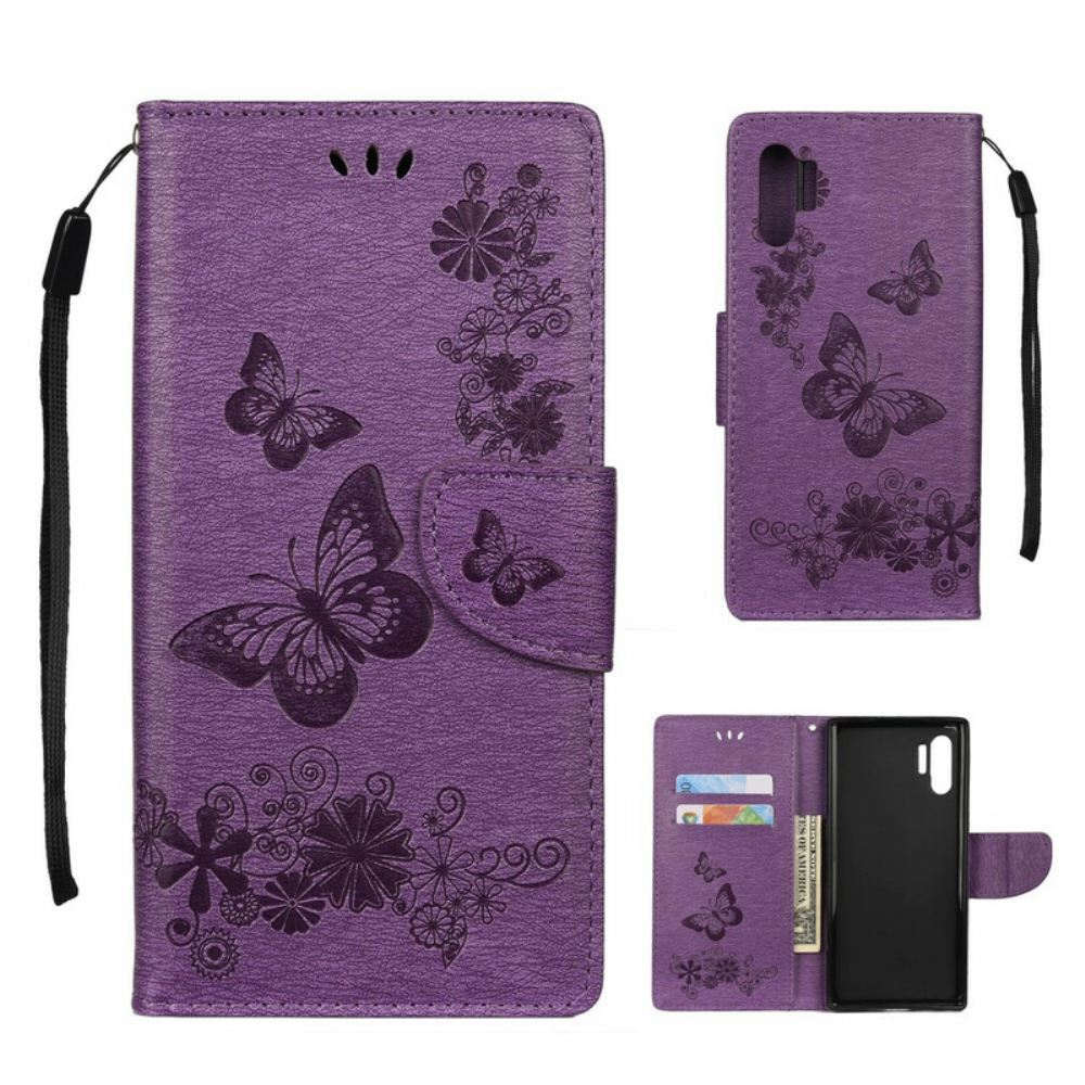 Kožené Pouzdro Na Samsung Galaxy Note 10 Plus Na Lana Motýli A Květinové Vazby