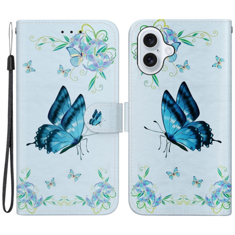 Kožený Kryt Na iPhone 16 Plus Modrí Motýli A Květiny S Popruhem