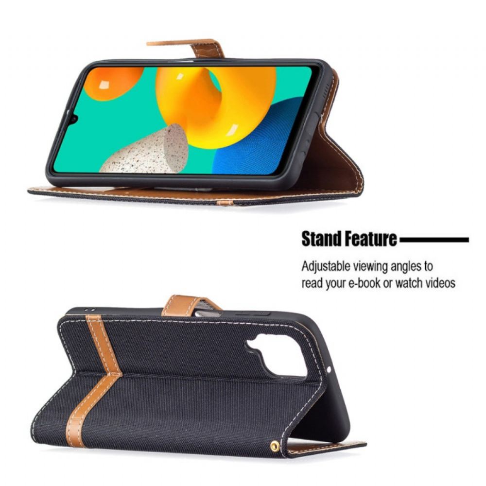 Flipové Pouzdro Na Samsung Galaxy M32 Na Lana Pásek S Látkovým A Koženým Efektem