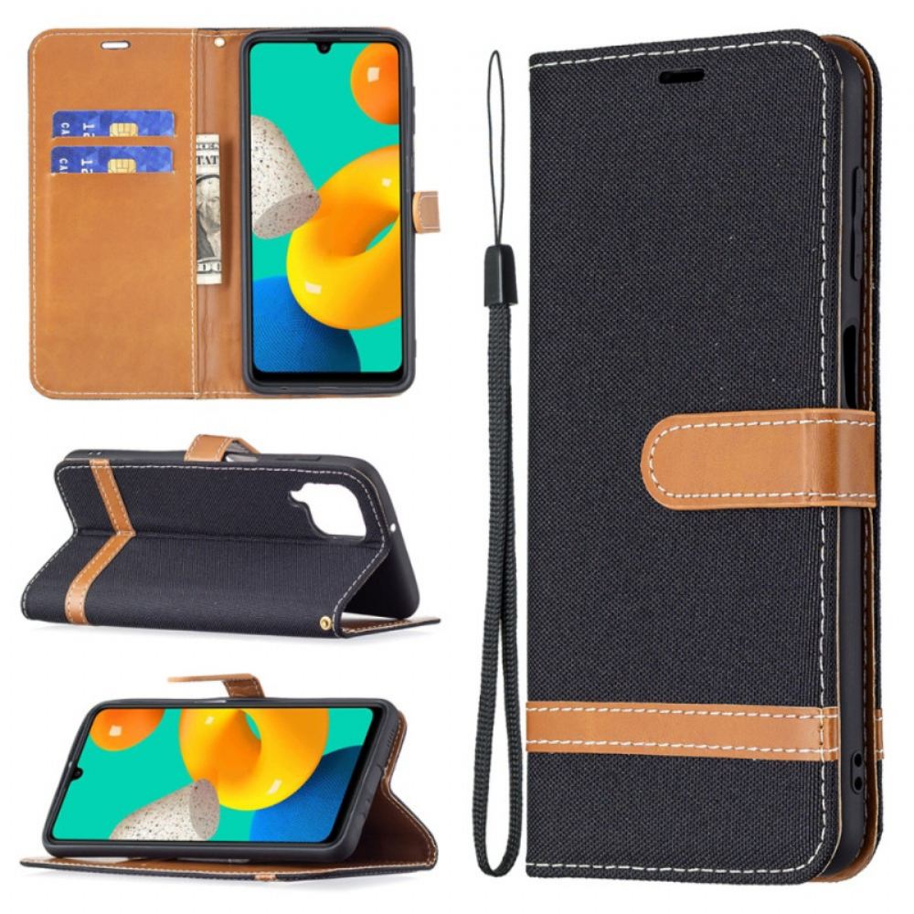 Flipové Pouzdro Na Samsung Galaxy M32 Na Lana Pásek S Látkovým A Koženým Efektem