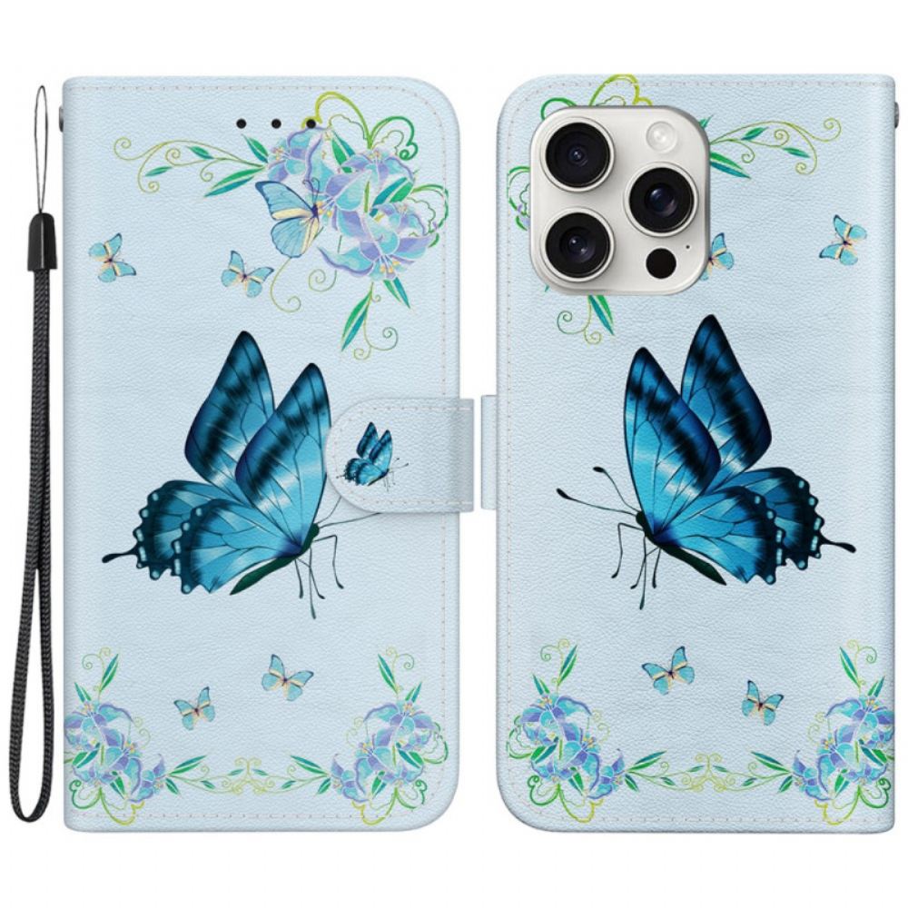 Peněženková Pouzdra iPhone 16 Pro Modrý Motýl A Květiny S Popruhem